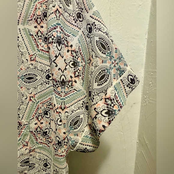 Maurices White and Green Blouse with Playful Pattern and Short Sleeves - Picture 3 of 10